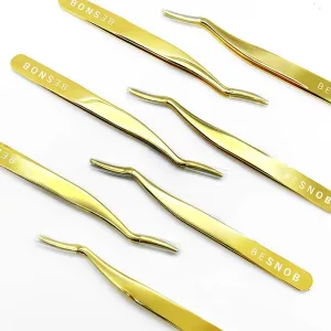 Seven BE SNOB Precision Lash Tweezers displayed in a top view arrangement