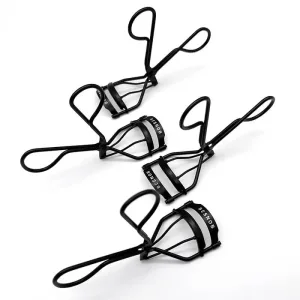 BE SNOB Professional Eyelash Curlers arranged in an angled composition